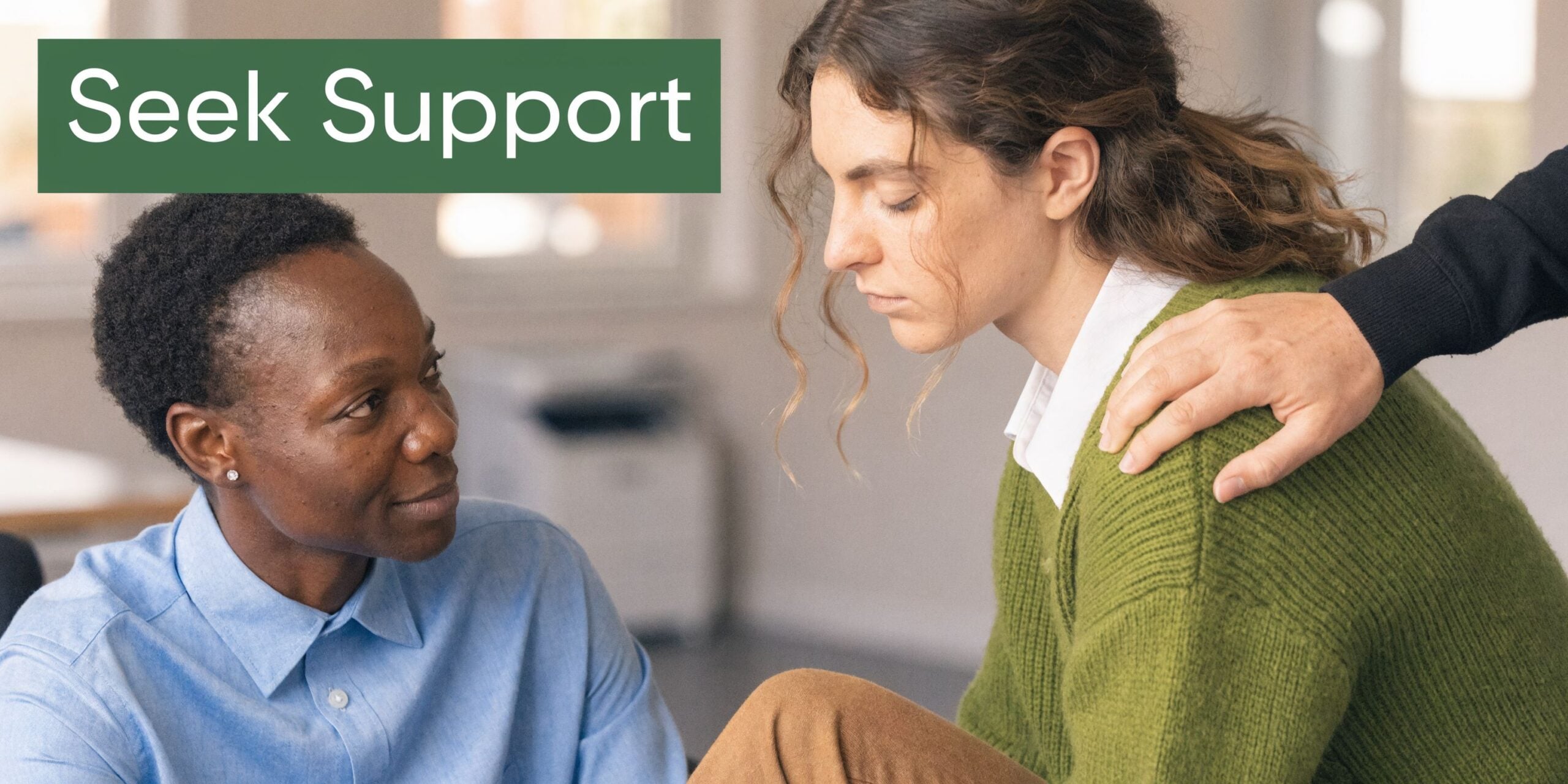 A supportive person offering comfort to a friend who is experiencing emotional distress or mental health challenges.